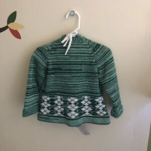 Hand knit baby back zip up hooded sweater.